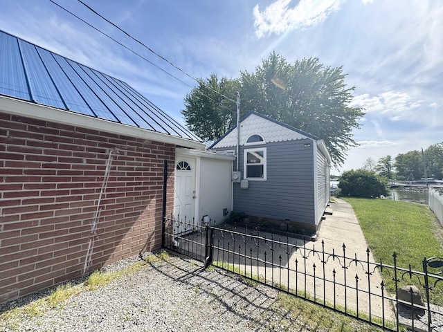 13864 Public Dr, Lakeview, OH 43331 - view of property exterior with metal roof