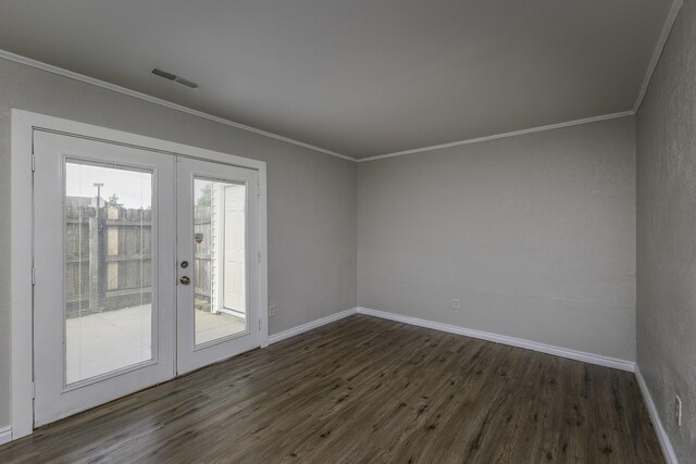3112 Legend Way, Dayton, OH 45449 - spare room with french doors, dark wood finished floors, and crown molding