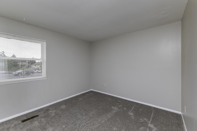 3112 Legend Way, Dayton, OH 45449 - unfurnished room with dark colored carpet and baseboards
