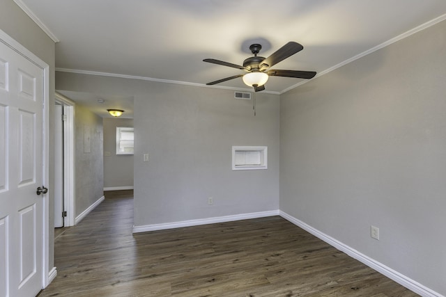 3112 Legend Way, Dayton, OH 45449 - spare room with a ceiling fan, dark wood finished floors, and ornamental molding