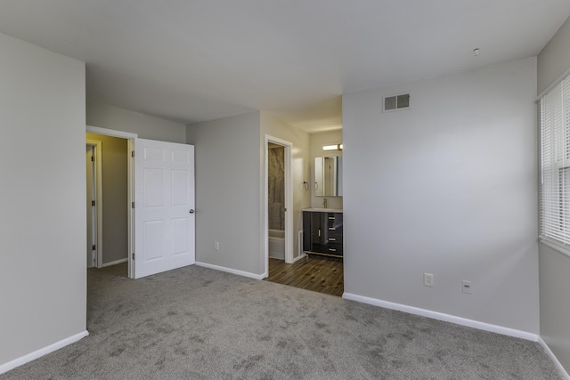 3112 Legend Way, Dayton, OH 45449 - unfurnished bedroom with carpet floors and ensuite bathroom