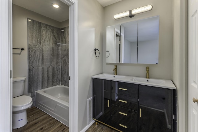 3112 Legend Way, Dayton, OH 45449 - full bathroom featuring wood finished floors, double vanity, and tub / shower combination