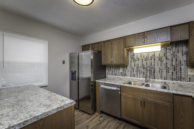 3112 Legend Way, Dayton, OH 45449 - kitchen featuring stainless steel appliances, light countertops, backsplash, and dark wood-style flooring