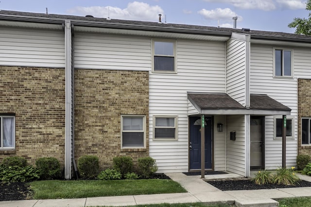 3112 Legend Way, Dayton, OH 45449 - view of front facade featuring brick siding