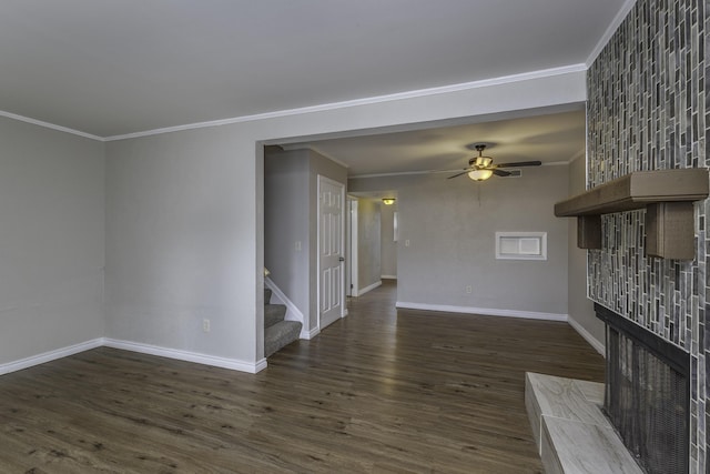 3112 Legend Way, Dayton, OH 45449 - unfurnished living room featuring ornamental molding, wood finished floors, ceiling fan, stairs, and a multi sided fireplace