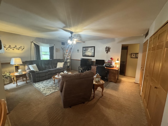 612 S Main St, Saint Marys, OH 45885 - carpeted living room featuring a ceiling fan and an office area