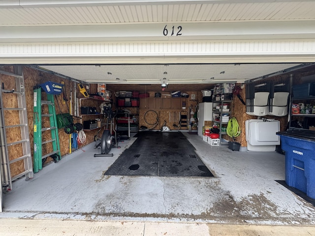 612 S Main St, Saint Marys, OH 45885 - garage featuring washer / dryer