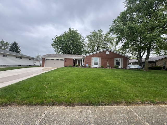 612 S Main St, Saint Marys, OH 45885 - ranch-style house with brick siding, driveway, a garage, and a front lawn