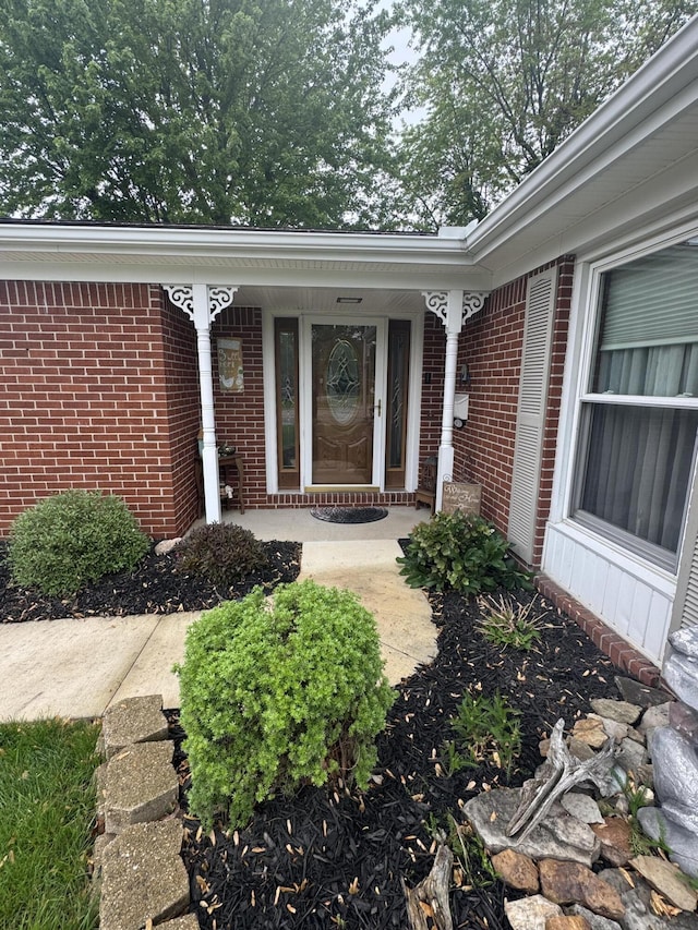 612 S Main St, Saint Marys, OH 45885 - entrance to property with brick siding and covered porch