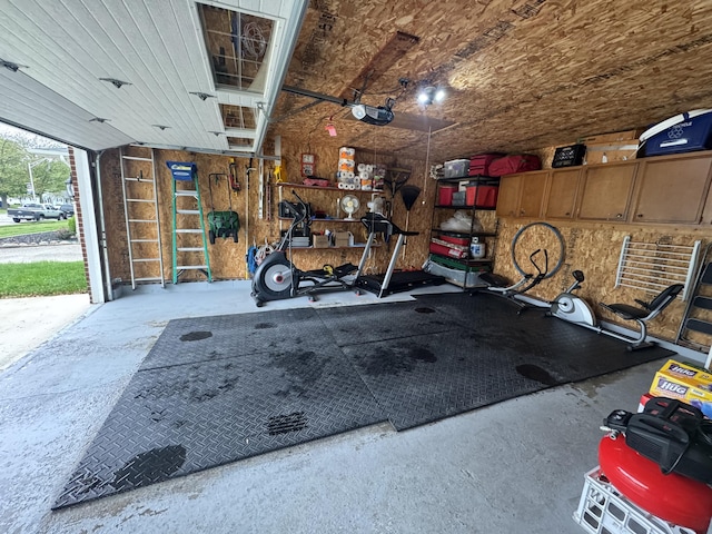 612 S Main St, Saint Marys, OH 45885 - garage with a garage door opener