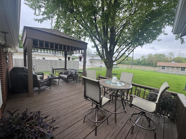 612 S Main St, Saint Marys, OH 45885 - wooden deck with an outdoor hangout area and grilling area