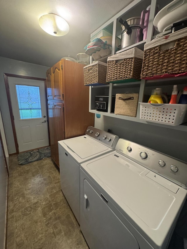 612 S Main St, Saint Marys, OH 45885 - laundry room featuring washing machine and clothes dryer and stone finish flooring