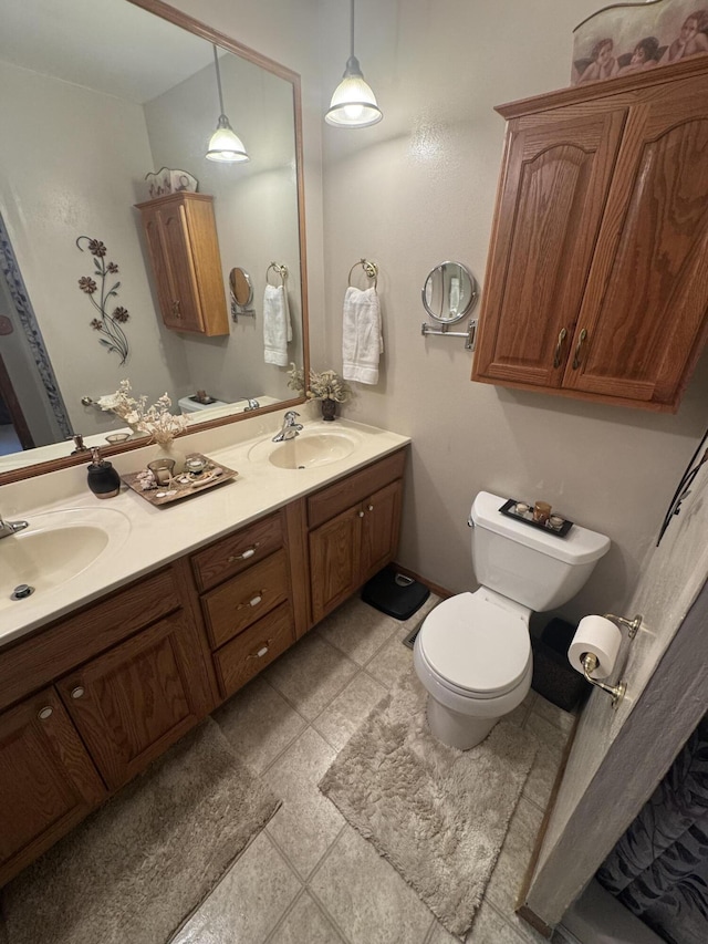 612 S Main St, Saint Marys, OH 45885 - full bathroom featuring toilet and double vanity