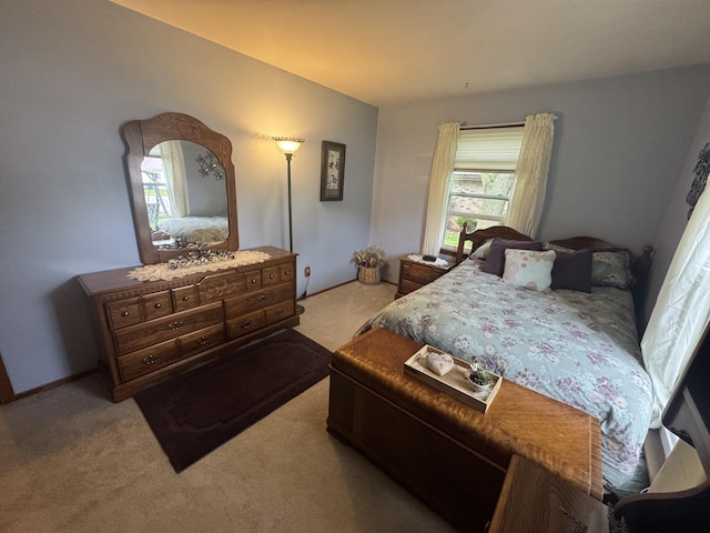 612 S Main St, Saint Marys, OH 45885 - bedroom featuring light colored carpet