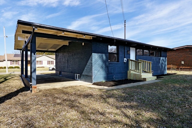 exterior space with a carport