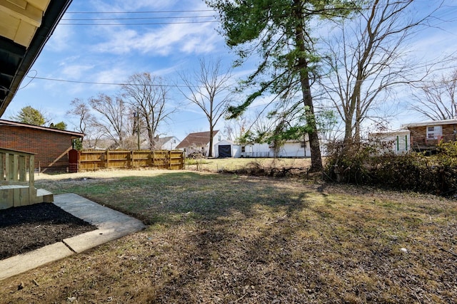 view of yard featuring fence