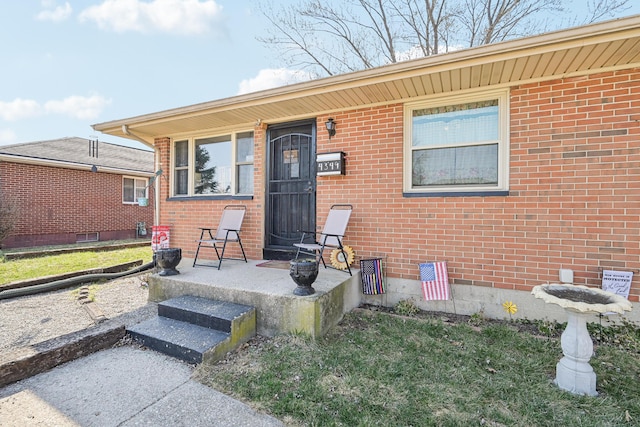 exterior space with brick siding