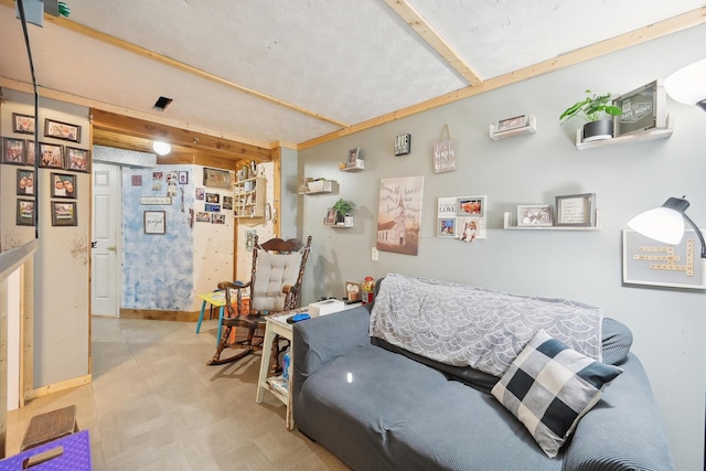 living area with tile patterned floors and baseboards