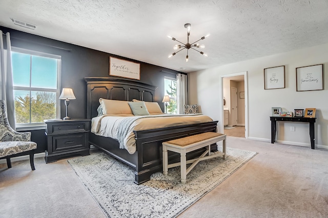 bedroom featuring a chandelier, visible vents, a textured ceiling, and light carpet