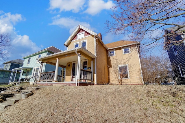 view of front of home featuring covered porch