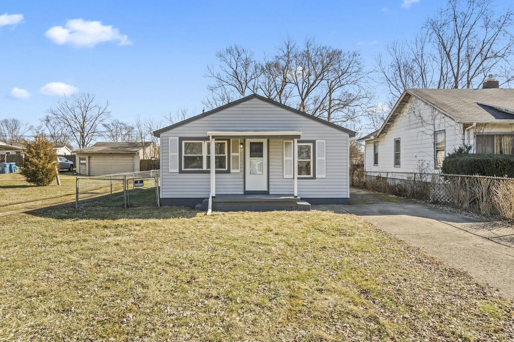 bungalow-style home with a porch and a front yard