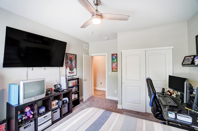 office featuring carpet floors and ceiling fan