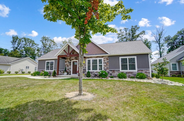 craftsman inspired home with a front yard