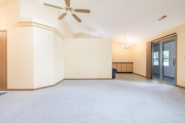 1534 Cross Pointe Cir, Bellefontaine, OH 43311 - unfurnished living room featuring a chandelier, light carpet, lofted ceiling, and a ceiling fan