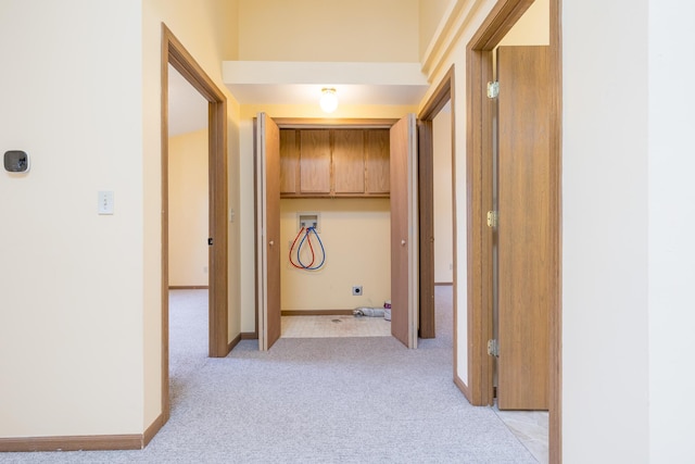 1534 Cross Pointe Cir, Bellefontaine, OH 43311 - hallway featuring light carpet and baseboards