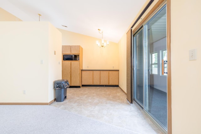 1534 Cross Pointe Cir, Bellefontaine, OH 43311 - unfurnished room featuring a chandelier and vaulted ceiling