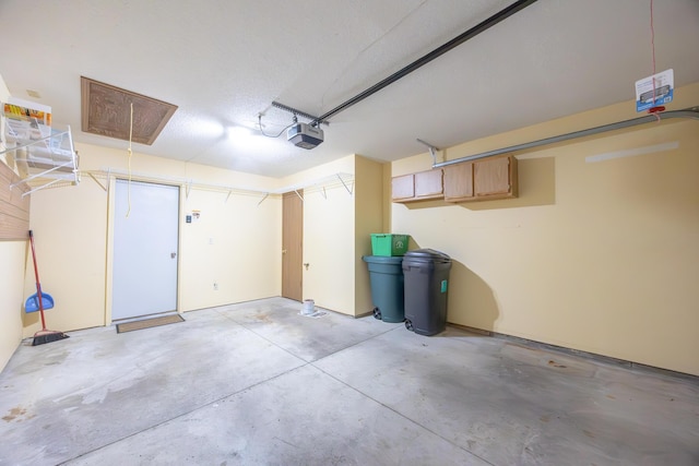 1534 Cross Pointe Cir, Bellefontaine, OH 43311 - garage featuring a garage door opener
