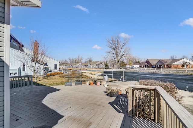 wooden terrace with a residential view