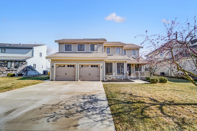 view of front of house featuring covered porch, concrete driveway, a front yard, a garage, and cooling unit