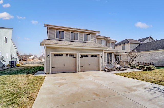 view of front of home with a garage, a front yard, driveway, and central AC unit