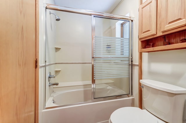 full bath featuring toilet, radiator, and enclosed tub / shower combo