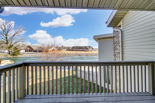 deck featuring a lawn