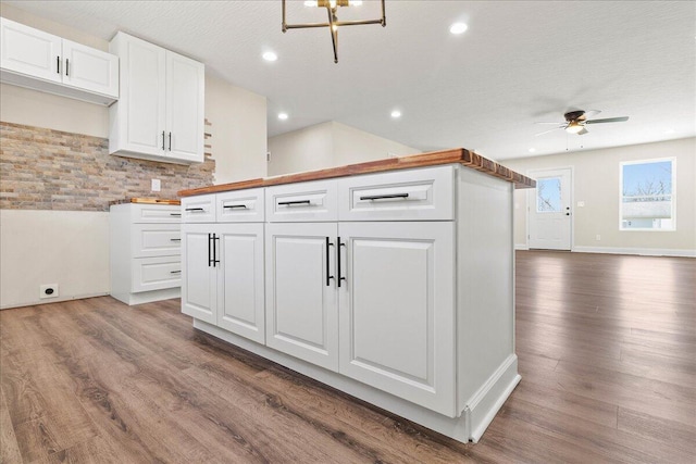 kitchen featuring white cabinetry, wood finished floors, recessed lighting, and a ceiling fan