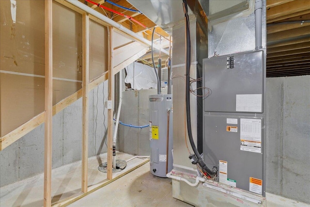 utility room featuring water heater