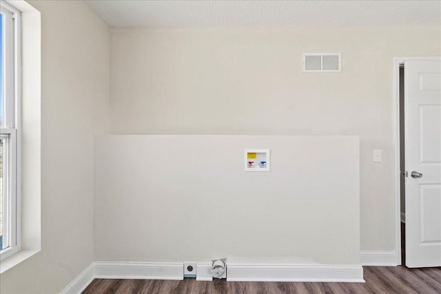 laundry area with visible vents, baseboards, washer hookup, laundry area, and dark wood-style floors