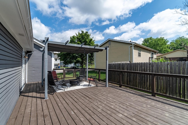 5175 Locust Post Ln, Columbus, OH 43230 - wooden deck with an outdoor fire pit