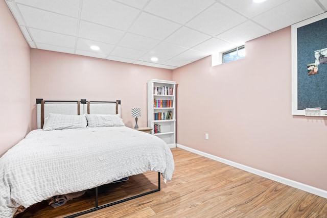 5175 Locust Post Ln, Columbus, OH 43230 - bedroom featuring wood finished floors, a paneled ceiling, and recessed lighting