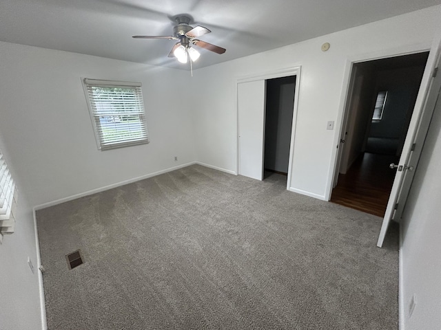 5151 Pheasant St, Lima, OH 45807 - unfurnished bedroom with carpet, a closet, and ceiling fan