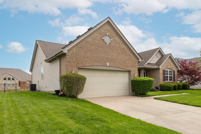 view of front of house with fence, concrete driveway, central AC, and brick siding