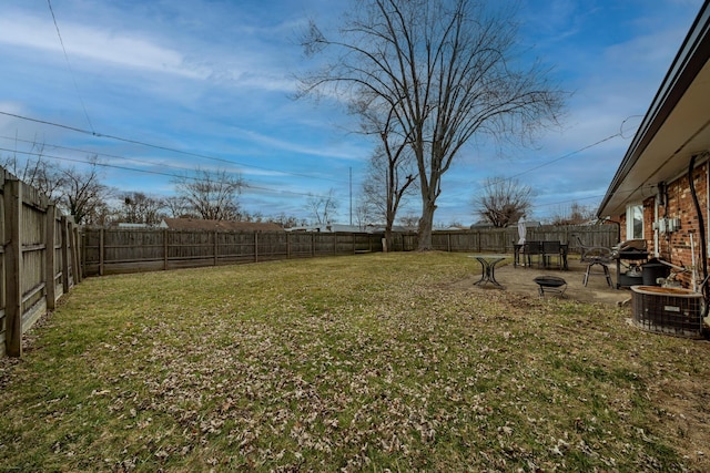 view of yard featuring a patio and a fenced backyard