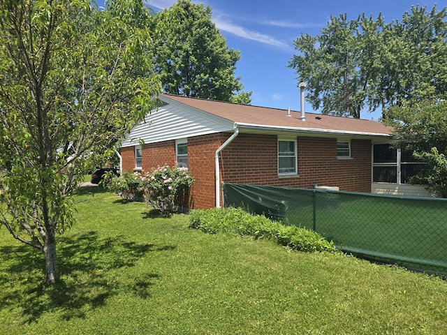 1006 Mayfield Dr, Troy, OH 45373 - view of side of property with brick siding