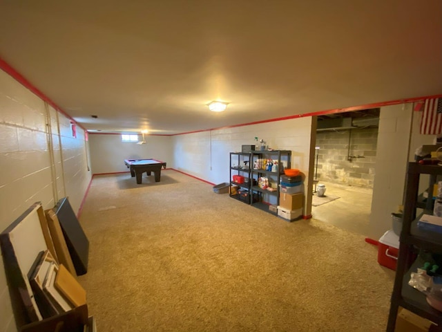 playroom featuring concrete block wall, carpet, and billiards