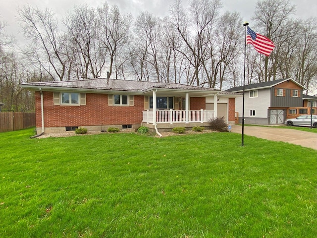 ranch-style home featuring concrete driveway, brick siding, a porch, and a front yard