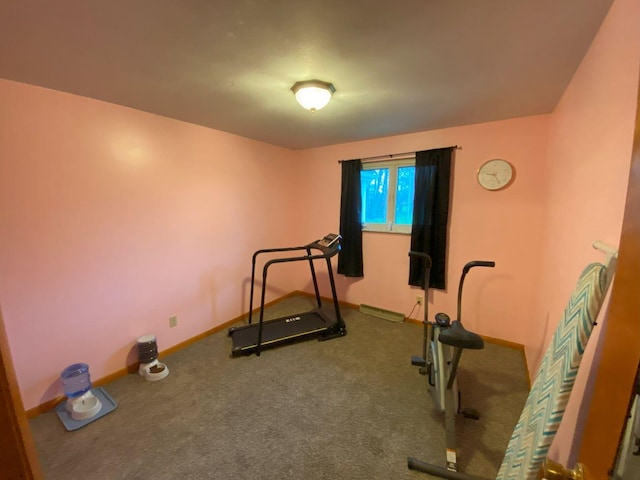 exercise area with carpet and baseboards