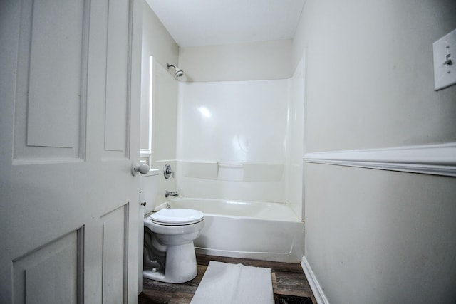 422 New St, Sidney, OH 45365 - bathroom with toilet, hardwood / wood-style flooring, and  shower combination