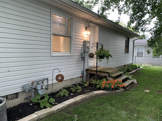 6645 Oak Dr, Celina, OH 45822 - view of property exterior featuring crawl space and a yard
